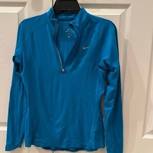 Size small Nike women’s quarter zip hardly worn in turquoise